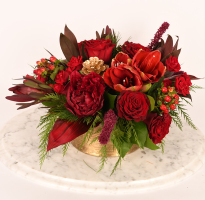 <H1> Holiday in Red Centerpiece </H1>  from Mockingbird Florist in Dallas, TX