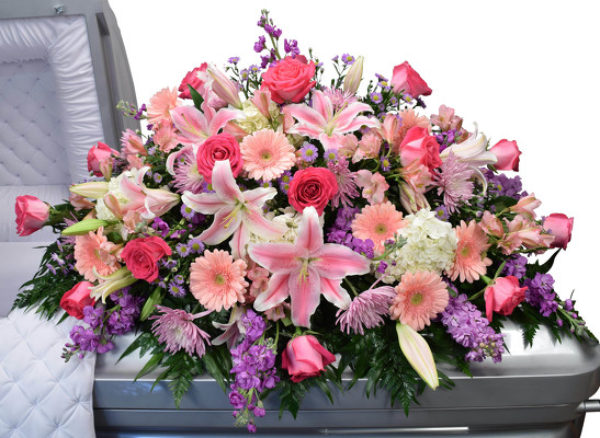 <h1> Roses, Lilies and Mums Casket </h1> from Mockingbird Florist in Dallas, TX