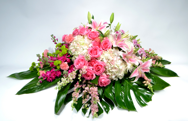 <H1> Pink Tribute Casket Spray </H1> from Mockingbird Florist in Dallas, TX