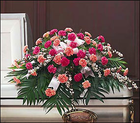 Delicate Pink Casket Spray Sympathy from Mockingbird Florist in Dallas, TX